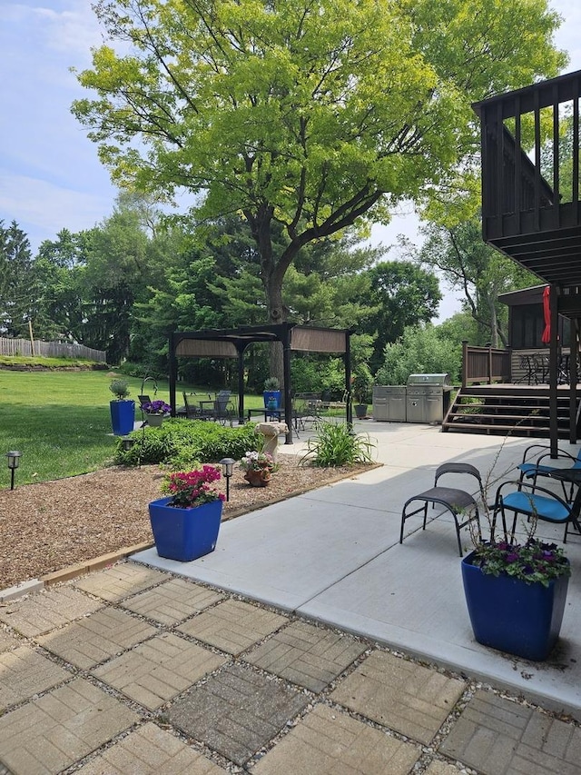 1718 Rosewood Ln, Johnsburg, IL 60051 - view of patio / terrace featuring a wooden deck and view of wooded area