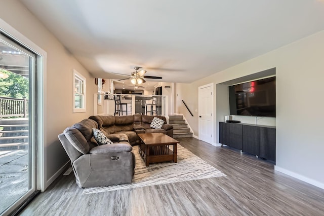 1718 Rosewood Ln, Johnsburg, IL 60051 - living room featuring wood finished floors, stairs, and a ceiling fan