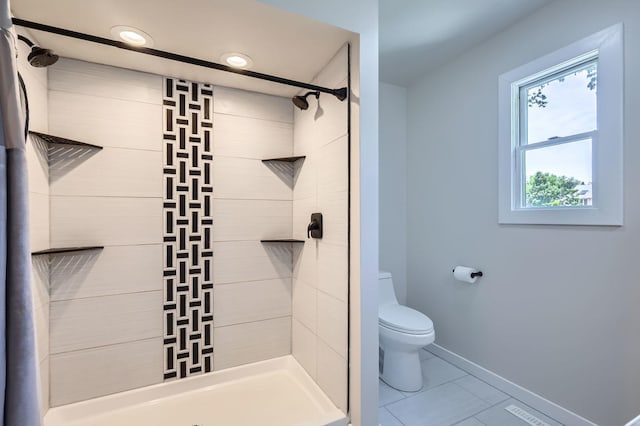 1718 Rosewood Ln, Johnsburg, IL 60051 - bathroom with tiled shower, tile patterned floors, and recessed lighting