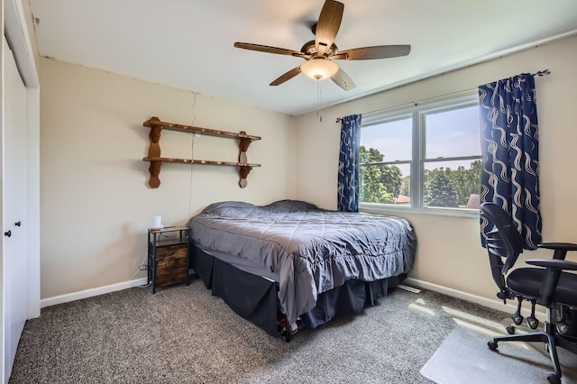 1718 Rosewood Ln, Johnsburg, IL 60051 - carpeted bedroom featuring baseboards and ceiling fan