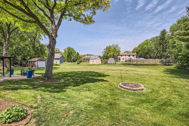 1718 Rosewood Ln, Johnsburg, IL 60051 - view of yard with an outdoor structure and a patio