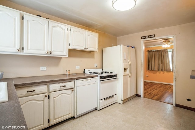 405 Judson St, Bensenville, IL 60106 - kitchen featuring white appliances, dark countertops, ceiling fan, and white cabinetry