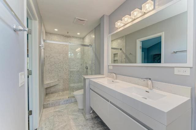 2716 Burton Dr, Westchester, IL 60154 - full bathroom with double vanity, a stall shower, marble finish floors, and recessed lighting