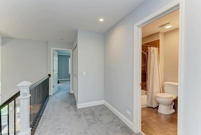 2716 Burton Dr, Westchester, IL 60154 - hallway featuring an upstairs landing, light colored carpet, and recessed lighting