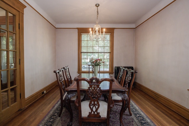 312 Home Ave, Oak Park, IL 60302 - dining space featuring a chandelier and wood finished floors