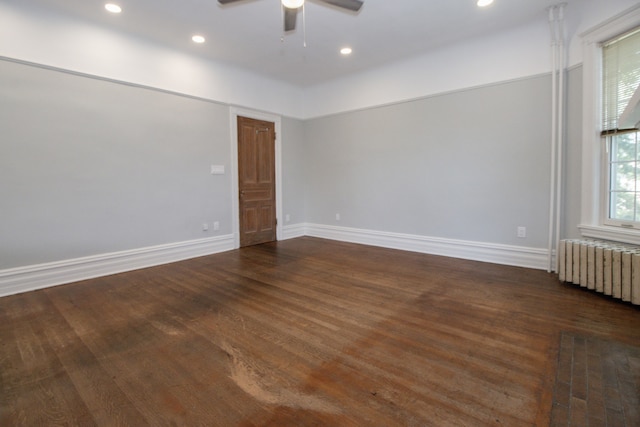 312 Home Ave, Oak Park, IL 60302 - spare room featuring radiator heating unit, dark wood-style flooring, recessed lighting, and ceiling fan