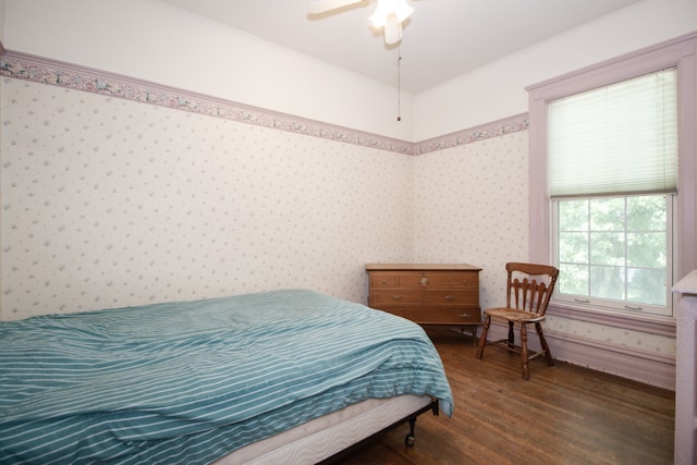312 Home Ave, Oak Park, IL 60302 - bedroom with wallpapered walls, wood finished floors, and a ceiling fan
