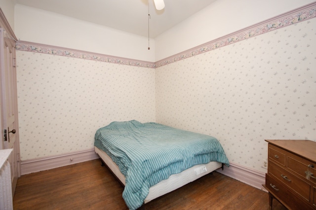 312 Home Ave, Oak Park, IL 60302 - bedroom with wood finished floors, wallpapered walls, and a ceiling fan