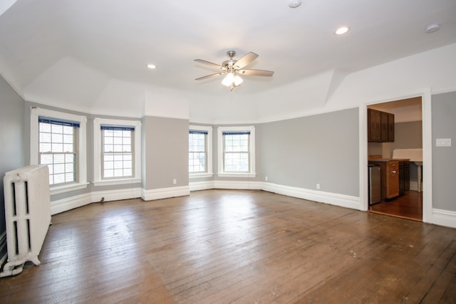 312 Home Ave, Oak Park, IL 60302 - unfurnished living room with radiator heating unit, dark wood-type flooring, a ceiling fan, vaulted ceiling, and recessed lighting