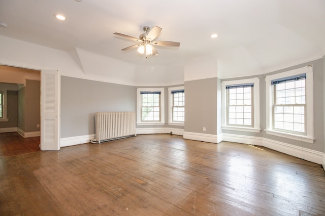 312 Home Ave, Oak Park, IL 60302 - unfurnished living room with radiator heating unit, hardwood / wood-style floors, a ceiling fan, lofted ceiling, and recessed lighting
