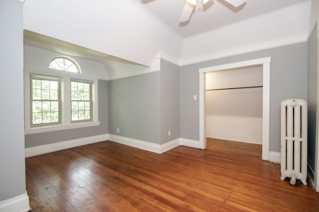 312 Home Ave, Oak Park, IL 60302 - unfurnished room featuring radiator, a ceiling fan, wood-type flooring, and lofted ceiling