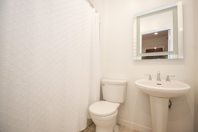 312 Home Ave, Oak Park, IL 60302 - bathroom featuring toilet and tile patterned flooring