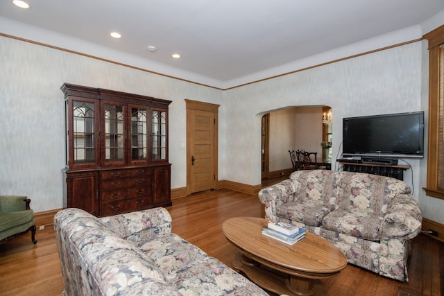312 Home Ave, Oak Park, IL 60302 - living area featuring arched walkways, recessed lighting, wood finished floors, and wallpapered walls