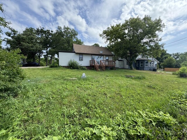 42309 N Woodbine Ave, Antioch, IL 60002 - view of grassy yard with a wooden deck