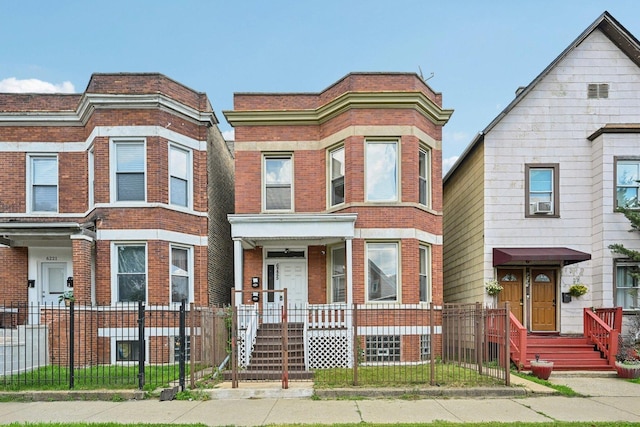 6225 S Wood St, Chicago, IL 60636 - multi unit property featuring brick siding and a fenced front yard
