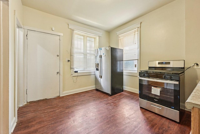 6225 S Wood St, Chicago, IL 60636 - kitchen with stainless steel appliances, dark wood-style floors, and plenty of natural light