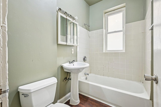 6225 S Wood St, Chicago, IL 60636 - bathroom featuring shower / washtub combination and wood finished floors