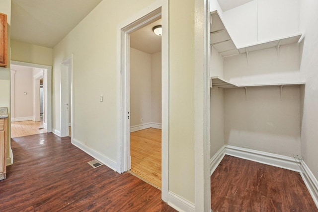 6225 S Wood St, Chicago, IL 60636 - hall featuring dark wood-style flooring and baseboards