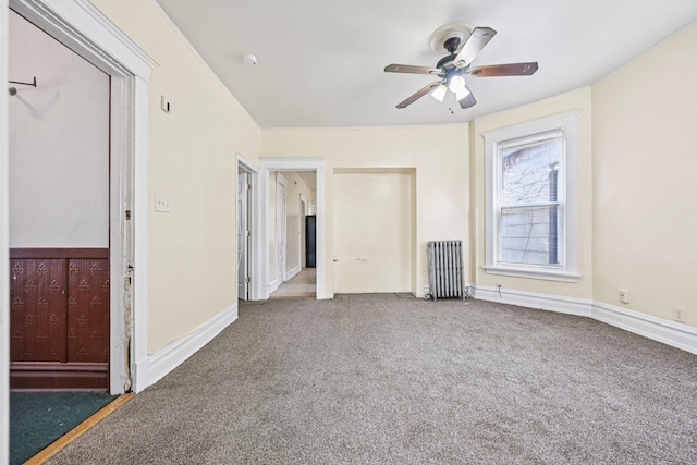6225 S Wood St, Chicago, IL 60636 - unfurnished living room featuring radiator, a ceiling fan, and carpet