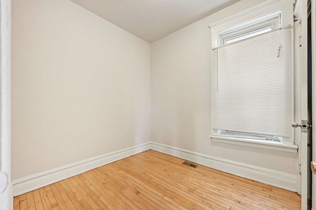 6225 S Wood St, Chicago, IL 60636 - empty room featuring baseboards and hardwood / wood-style flooring