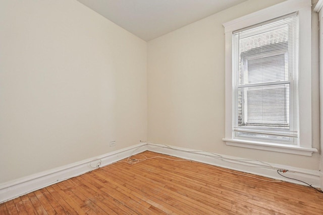 6225 S Wood St, Chicago, IL 60636 - spare room with hardwood / wood-style flooring and baseboards