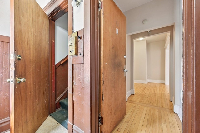 6225 S Wood St, Chicago, IL 60636 - hallway featuring light wood-style floors and baseboards