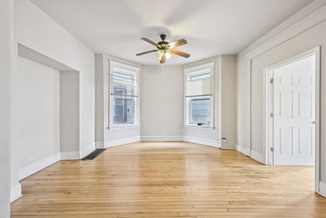 6225 S Wood St, Chicago, IL 60636 - empty room with ceiling fan and light wood finished floors