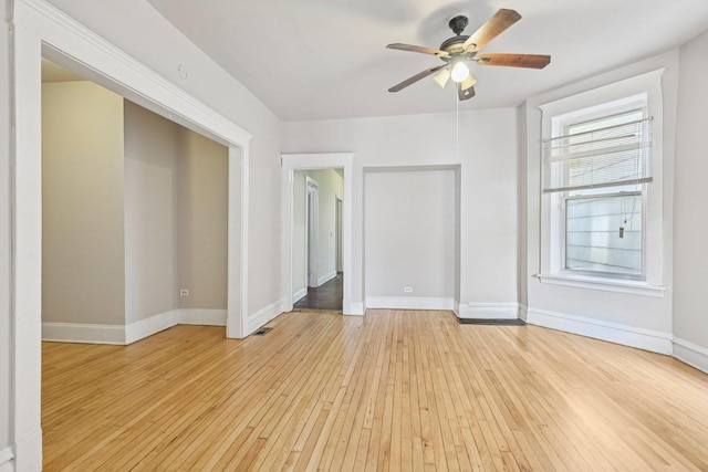 6225 S Wood St, Chicago, IL 60636 - empty room featuring light wood finished floors and a ceiling fan