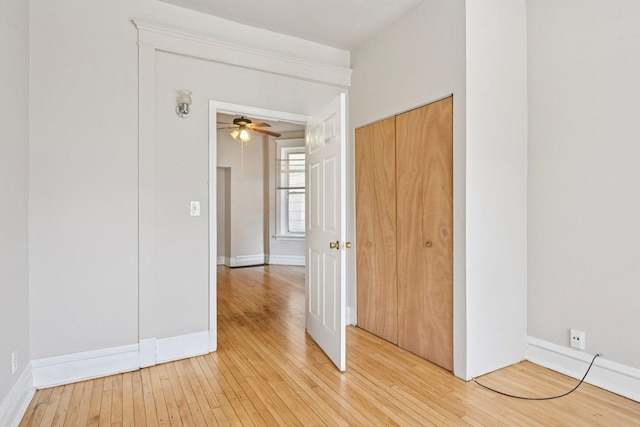 6225 S Wood St, Chicago, IL 60636 - unfurnished bedroom featuring light wood-style floors and a closet