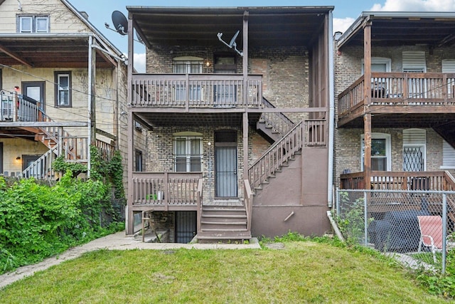 6225 S Wood St, Chicago, IL 60636 - rear view of property featuring stairs and brick siding