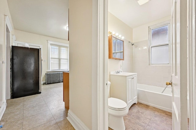6225 S Wood St, Chicago, IL 60636 - bathroom with radiator, vanity, tile patterned flooring, and  shower combination