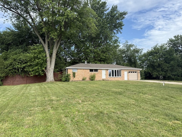 1826 Albert Ln, Wilmington, IL 60481 - ranch-style house with a garage, a front lawn, brick siding, and driveway