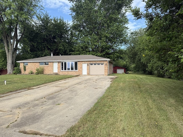 1826 Albert Ln, Wilmington, IL 60481 - view of front of property with an attached garage, driveway, a front yard, and brick siding