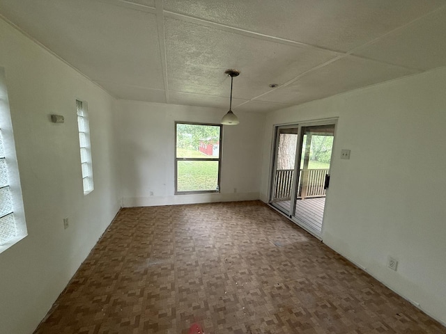 1826 Albert Ln, Wilmington, IL 60481 - unfurnished dining area featuring a textured ceiling