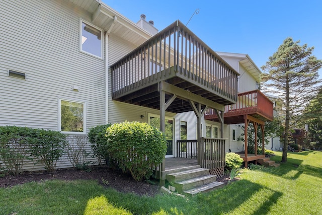 818 Metz Ln, Rockton, IL 61072 - back of property featuring a yard and a wooden deck