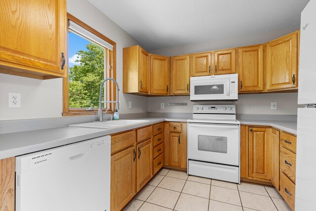 818 Metz Ln, Rockton, IL 61072 - kitchen featuring white appliances, light tile patterned flooring, and light countertops