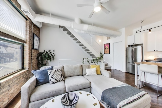 1720 N Marshfield Ave Unit 108, Chicago, IL 60622 - living room featuring dark wood-style floors, stairs, and ceiling fan