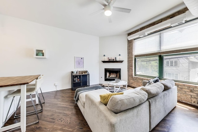 1720 N Marshfield Ave Unit 108, Chicago, IL 60622 - living room featuring ceiling fan, dark wood-style floors, and a fireplace