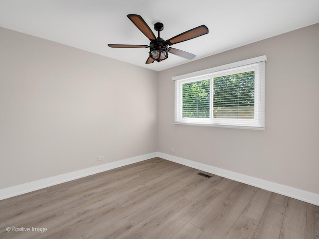 865 W Bryn Mawr Ave, Roselle, IL 60172 - unfurnished room with light wood-type flooring and ceiling fan