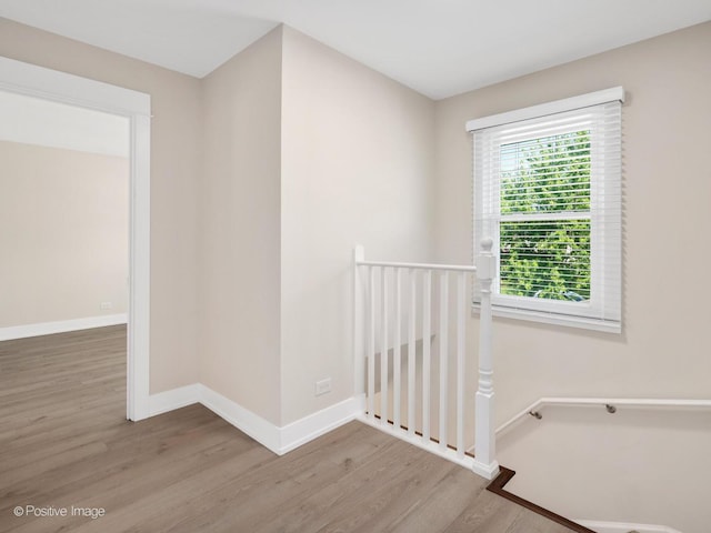865 W Bryn Mawr Ave, Roselle, IL 60172 - corridor with an upstairs landing and wood finished floors