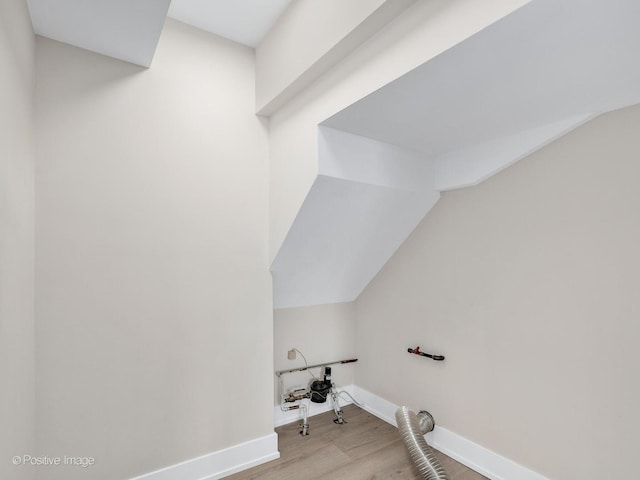 865 W Bryn Mawr Ave, Roselle, IL 60172 - laundry area featuring wood finished floors and baseboards