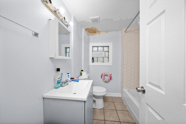 4532 S Laflin St, Chicago, IL 60609 - full bathroom featuring vanity, tile patterned floors, and washtub / shower combination