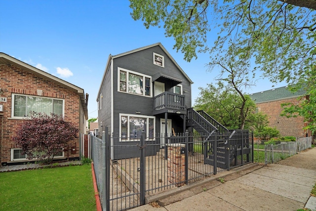 4532 S Laflin St, Chicago, IL 60609 - view of front facade featuring a fenced front yard, a gate, and stairway