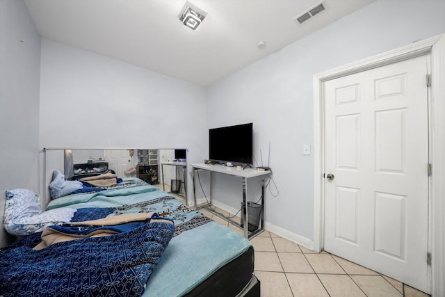 4532 S Laflin St, Chicago, IL 60609 - bedroom with light tile patterned floors and baseboards