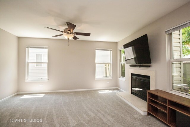 1109 Blackburn Dr, Grayslake, IL 60030 - unfurnished living room with ceiling fan, a fireplace, and carpet floors