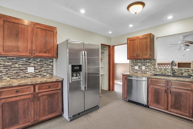 203 E Wilson, Tuscola, IL 61953 - kitchen featuring stainless steel appliances, light carpet, decorative backsplash, light stone countertops, and recessed lighting