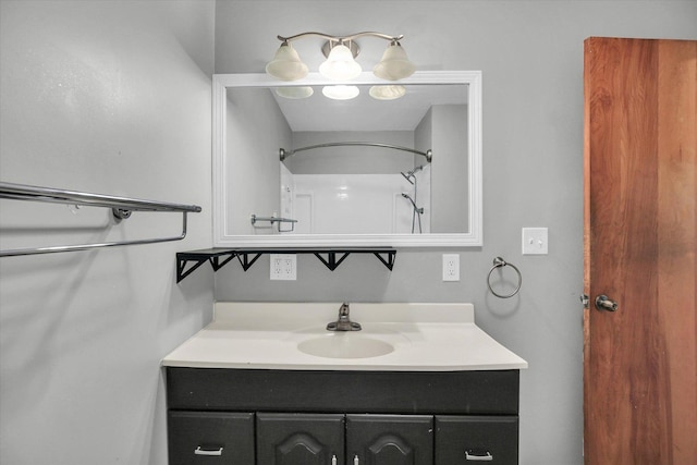 203 E Wilson, Tuscola, IL 61953 - bathroom featuring vanity and a shower