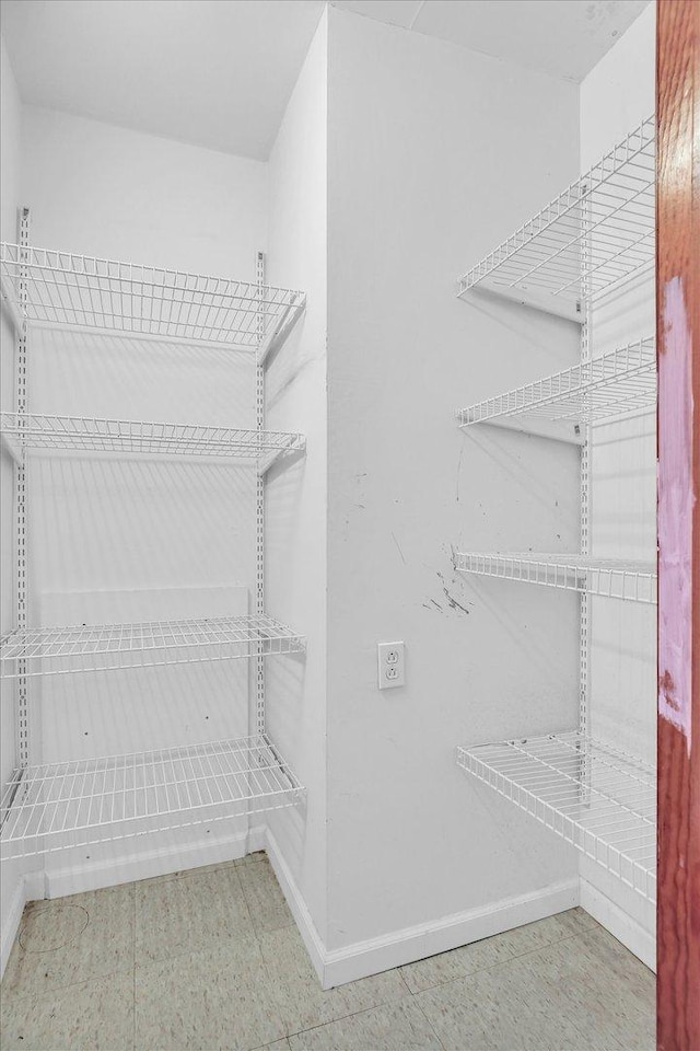 203 E Wilson, Tuscola, IL 61953 - walk in closet with tile patterned floors