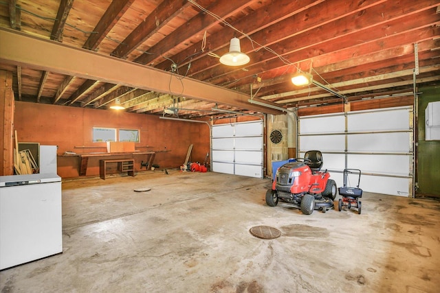203 E Wilson, Tuscola, IL 61953 - garage with white refrigerator