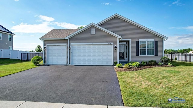 2215 Truman Trl, Mchenry, IL 60051 - single story home featuring asphalt driveway and an attached garage